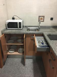 A kitchen or kitchenette at Hotel Albanta