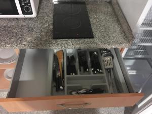 A kitchen or kitchenette at Hotel Albanta