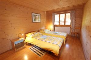 Postel nebo postele na pokoji v ubytování B&B Le Berceau