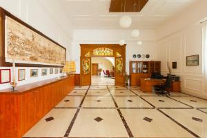 a large room with a lobby with a tile floor at Complex Villas Kaliakra & Gradina in Bŭlgarevo +37 photos