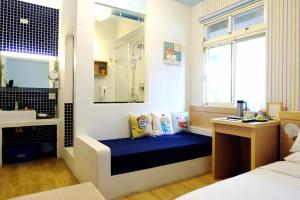 Postel nebo postele na pokoji v ubytování Ming Shui Lu Homestay