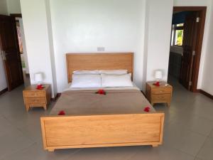Letto o letti in una camera di Sailfish Beach Villas