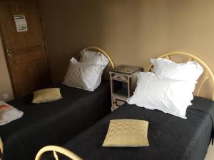 Letto o letti in una camera di Chambre d'hotes la Quercynoise