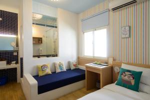 Postel nebo postele na pokoji v ubytování Ming Shui Lu Homestay