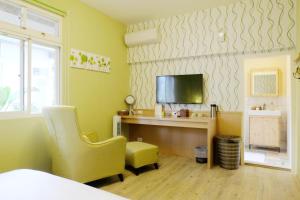 TV a/nebo společenská místnost v ubytování Ming Shui Lu Homestay