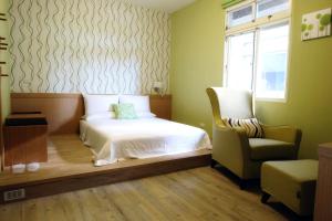 Postel nebo postele na pokoji v ubytování Ming Shui Lu Homestay