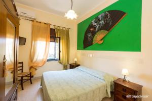Postel nebo postele na pokoji v ubytování B&B Villa Pia