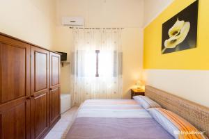 Postel nebo postele na pokoji v ubytování B&B Villa Pia