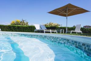 The swimming pool at or close to Poggio al Casone Még 30 kép