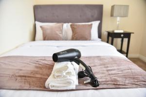 מיטה או מיטות בחדר ב-Smartrips Apartments