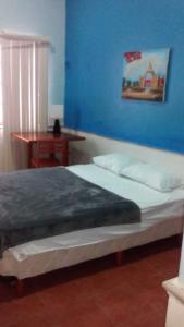 Postel nebo postele na pokoji v ubytování Yucatan Vista Inn Guest House