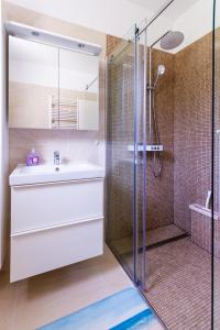Ванная комната в Apartman Orlando