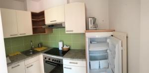 A kitchen or kitchenette at Gasserhof Aicha