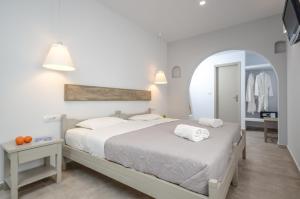 Posteľ alebo postele v izbe v ubytovaní Argo Boutique Hotel