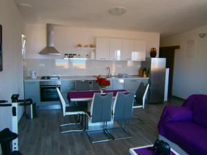Kuchyň nebo kuchyňský kout v ubytování Apartment Willy