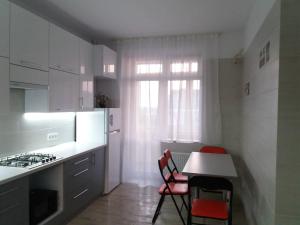 Kuchyň nebo kuchyňský kout v ubytování 2-х кім. кв. по вул. Кн. Ольги, р-н Вікторія Гарден.