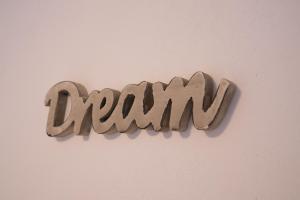 a sign that says crook hanging on a wall at Apartments Braut Krk in Krk