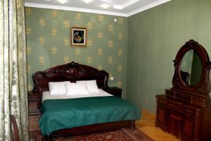 Postel nebo postele na pokoji v ubytování Green Guest House