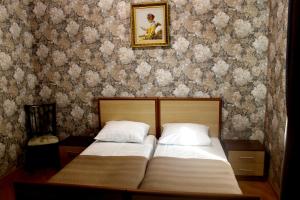 Postel nebo postele na pokoji v ubytování Green Guest House