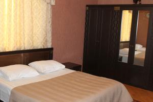 Postel nebo postele na pokoji v ubytování Green Guest House