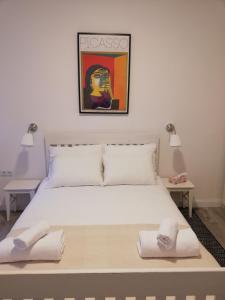 Postel nebo postele na pokoji v ubytování Amalia Apartments