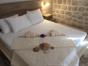 Кровать или кровати в номере Apartment Radimiri