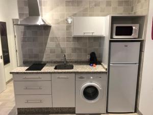 Nhà bếp/bếp nhỏ tại Piscina en Herrería 18 +6 ảnh