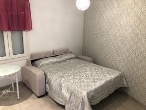 Giường trong phòng chung tại Piscina en Herrería 18