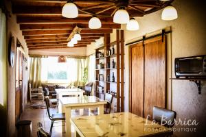 מסעדה או מקום אחר לאכול בו ב-Posada Boutique La Barrica
