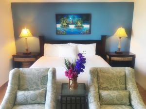 מיטה או מיטות בחדר ב-Suite San Juan 133 Gran Pacifica Resort