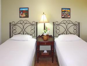 Postel nebo postele na pokoji v ubytování Suite San Juan 135 Gran Pacifica Resort + 29 fotografií