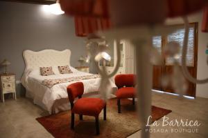 Una cama o camas en una habitación de Posada Boutique La Barrica