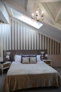 Katil atau katil-katil dalam bilik di Hotel Giulio Cesare