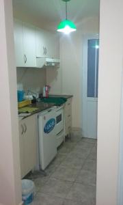 Una cocina o kitchenette en Departamentos Niñas