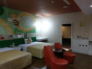Postel nebo postele na pokoji v ubytování Lisa Motel
