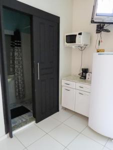Kuchyň nebo kuchyňský kout v ubytování Amanda Suites MAO