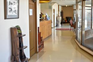 a hallway of a hospital with a hallway at Altitude Nozawa in Nozawa Onsen