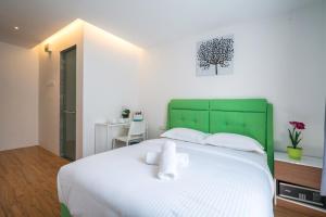 Postel nebo postele na pokoji v ubytování My Sj Hotel