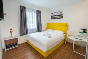 Postel nebo postele na pokoji v ubytování My Sj Hotel