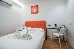Postel nebo postele na pokoji v ubytování My Sj Hotel