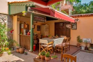 A patio or other outdoor area at Elaia Hotel