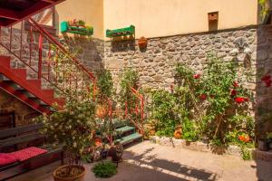 A garden outside Elaia Hotel