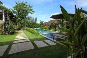 The swimming pool at or close to Casa Asia
