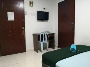 TV a/nebo společenská místnost v ubytování Kristal Inn Hotel UITM Shah Alam
