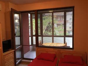 A television and/or entertainment centre at Apartment Martin Beach
