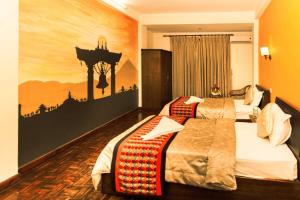 Letto o letti in una camera di Kathmandu Eco Hotel