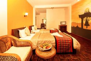 Letto o letti in una camera di Kathmandu Eco Hotel