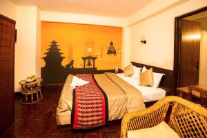Letto o letti in una camera di Kathmandu Eco Hotel