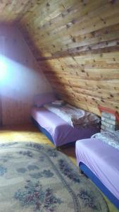 Postel nebo postele na pokoji v ubytování Holiday Home Ema