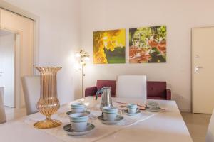 A bed or beds in a room at Cimadolmo Prosecco And History
